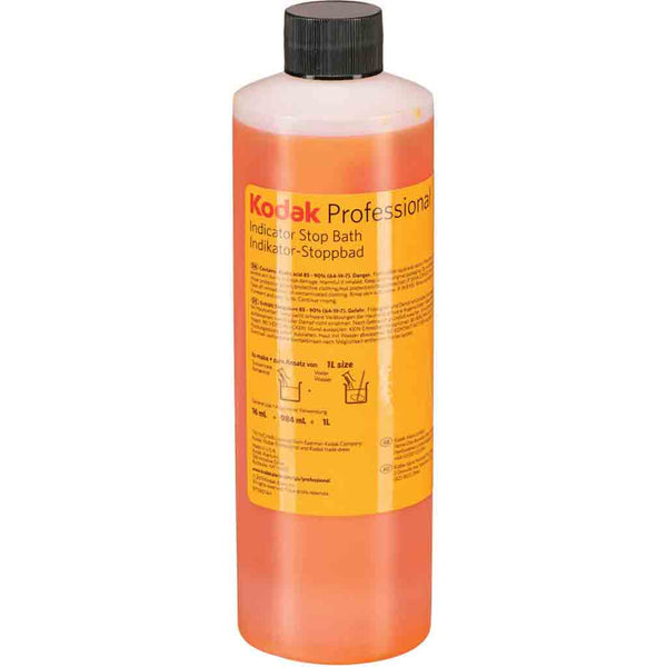 A plastic bottle of Kodak Professional Indicator Stop Bath, which is a photographic chemical for developing films.