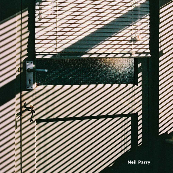 Window with blinds casting shadows on a door, titled 'Neil Parry'.