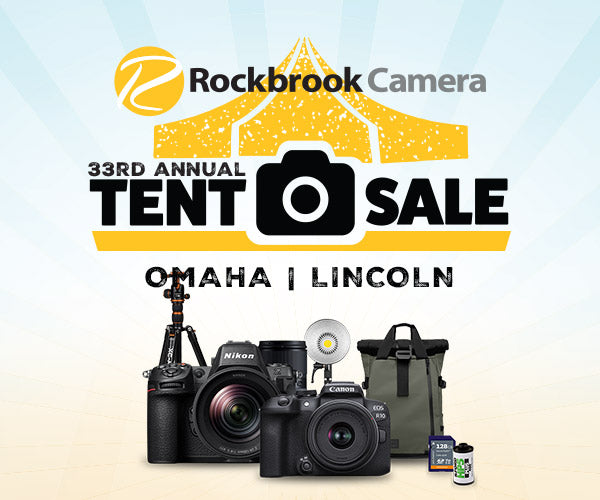 Advertisement for Rockbrook Camera's 33rd Annual Tent Sale with camera equipment and branding.