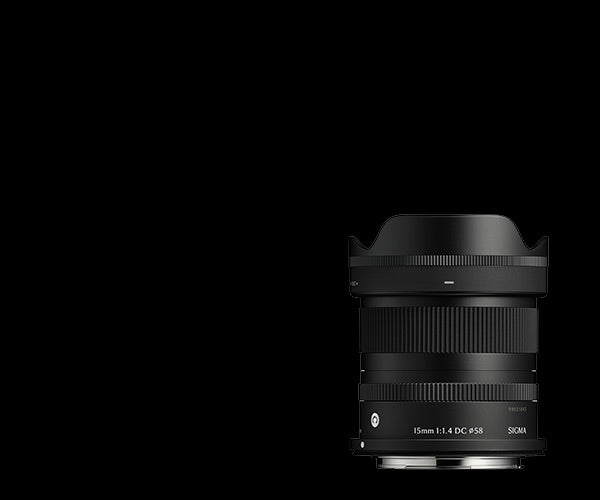 Black camera lens on a white background