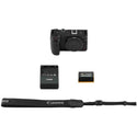 Canon R6 V camera with battery and charger on a white background