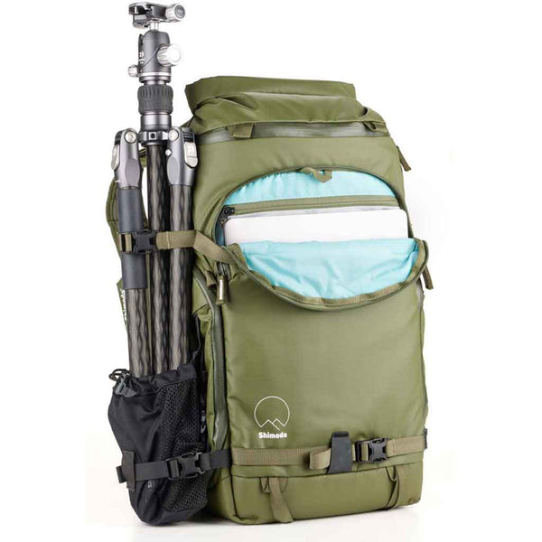 Tripod Carry Demonstration and Front Side Laptop Sleeve of the Shimoda Action X25 V2 Starter Kit Backpack Green