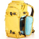 Side Pocket Access of the Shimoda X25 V2 Starter Kit Backpack Yellow