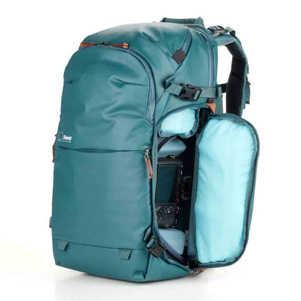 Side Access Pocket of the Shimoda Explore V2 25 Women's Starter Kit Backpack Teal