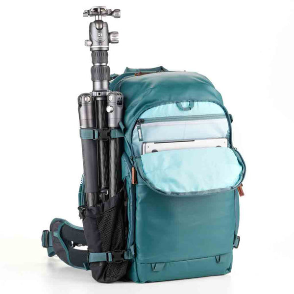 Tripod Carry Demonstration and Front Side Laptop Sleeve of the Shimoda Explore V2 25 Women's Starter Kit Teal 