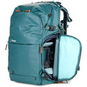 Side Access Pocket of the Shimoda Explore V2 Women's Starter Kit Backpack Teal