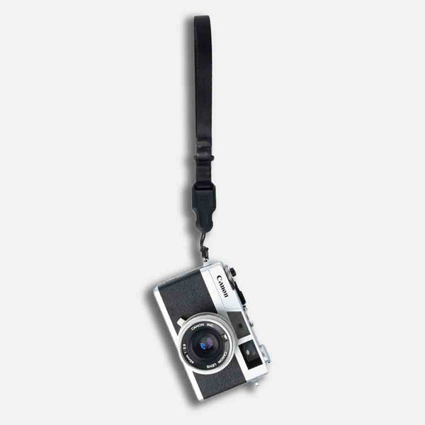 Attachment Demonstration of the WANDRD Magnetic Camera Wrist Strap Black