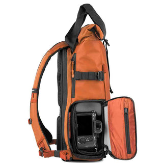 Side of the of the Wandrd PRVKE 21 V4 Backpack Sedona Orange