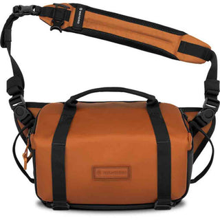 Front Side of the Wandrd Rogue Sling 6L V2 Bag Sedonda Orange
