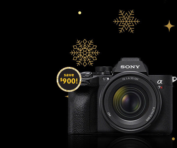 Sony camera with snowflake graphics and a discount label on a black background