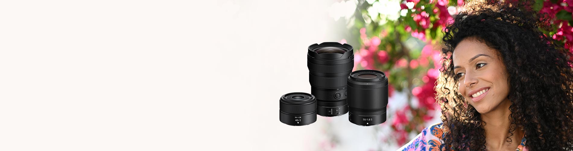Camera lenses with a blurred background of a woman and flowers