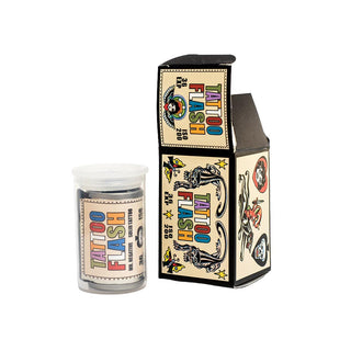 Tattoo Flash ink set with a small clear jar of black ink and a matching illustrated box on a plain white background.