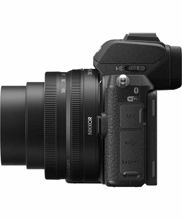 Port side view of Nikon Z50 camera with 16-50mm VR lens extended