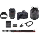 Canon EOS R5 with included 24-105mm L lens, battery, charger, lens hood, lens bag, camera strap, and cord