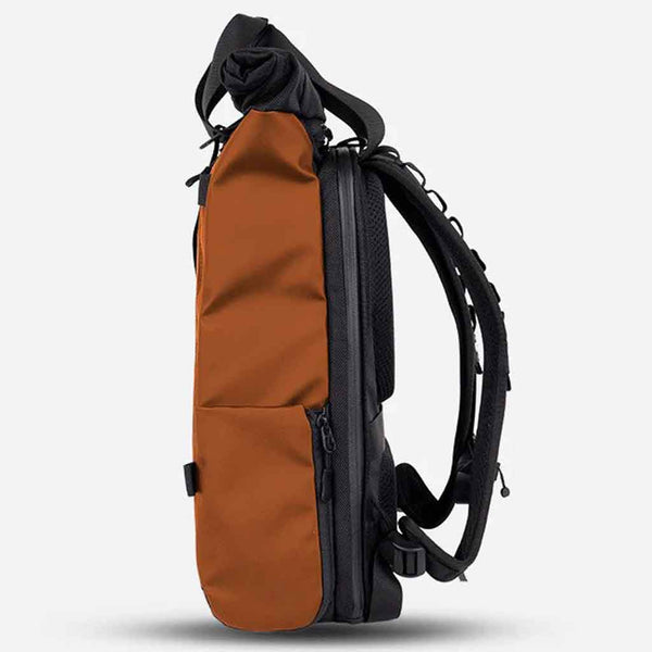 Tripod/Water Bottle Pocket of he WANDRD PRVKE Lite Sedona Orange